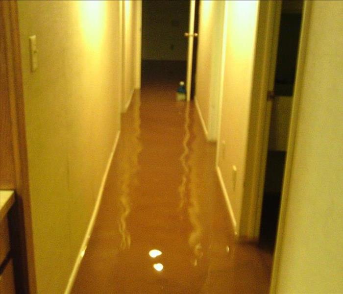 Flooded hall due to severe storms.