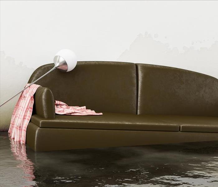 Image of a couch and a lamp floating in a flooded living room.